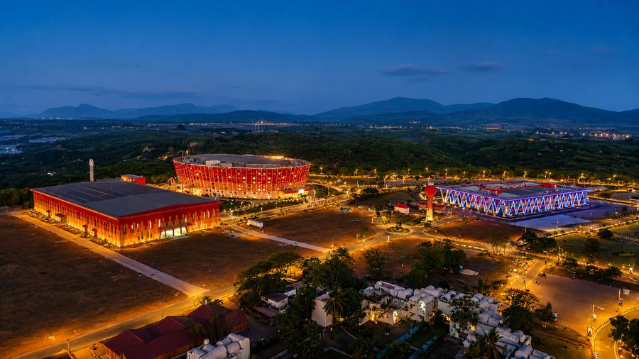 The UBCC campus at dusk with residency units in the foreground