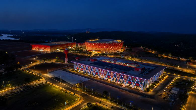The UBCC campus illuminated at night